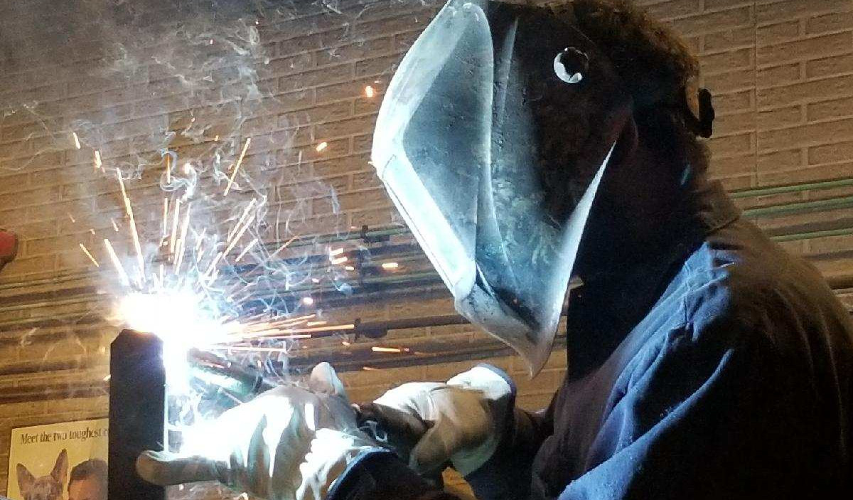 Man welding cropped WM Man welding