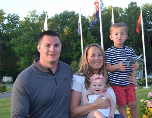 Jake Murphy, Engineer, with wife and children outside