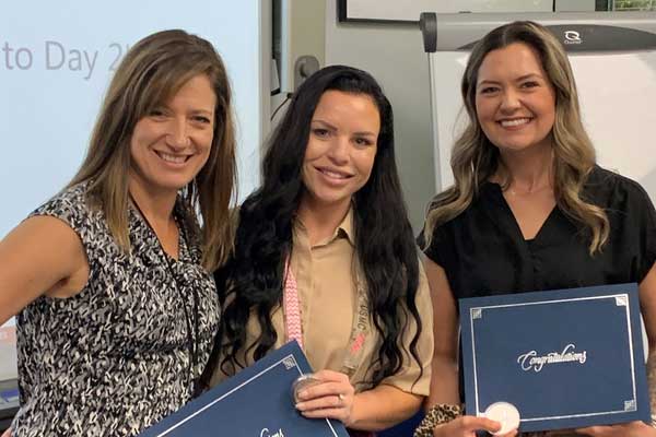 Professional Recongition Three women with Professional Recongition