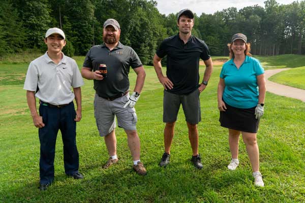 employees at a golf outing employees at a golf outing