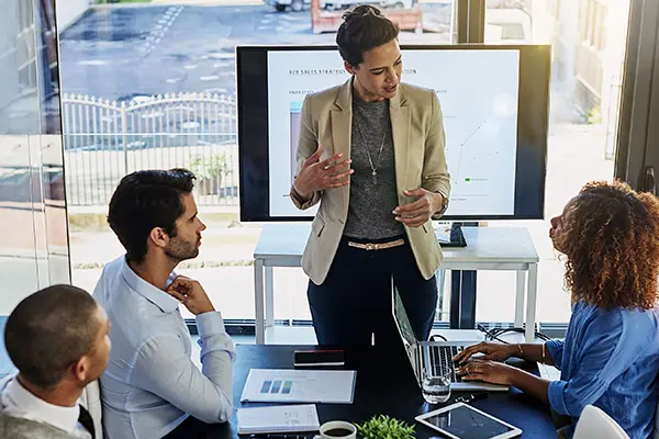 woman leads a meeting